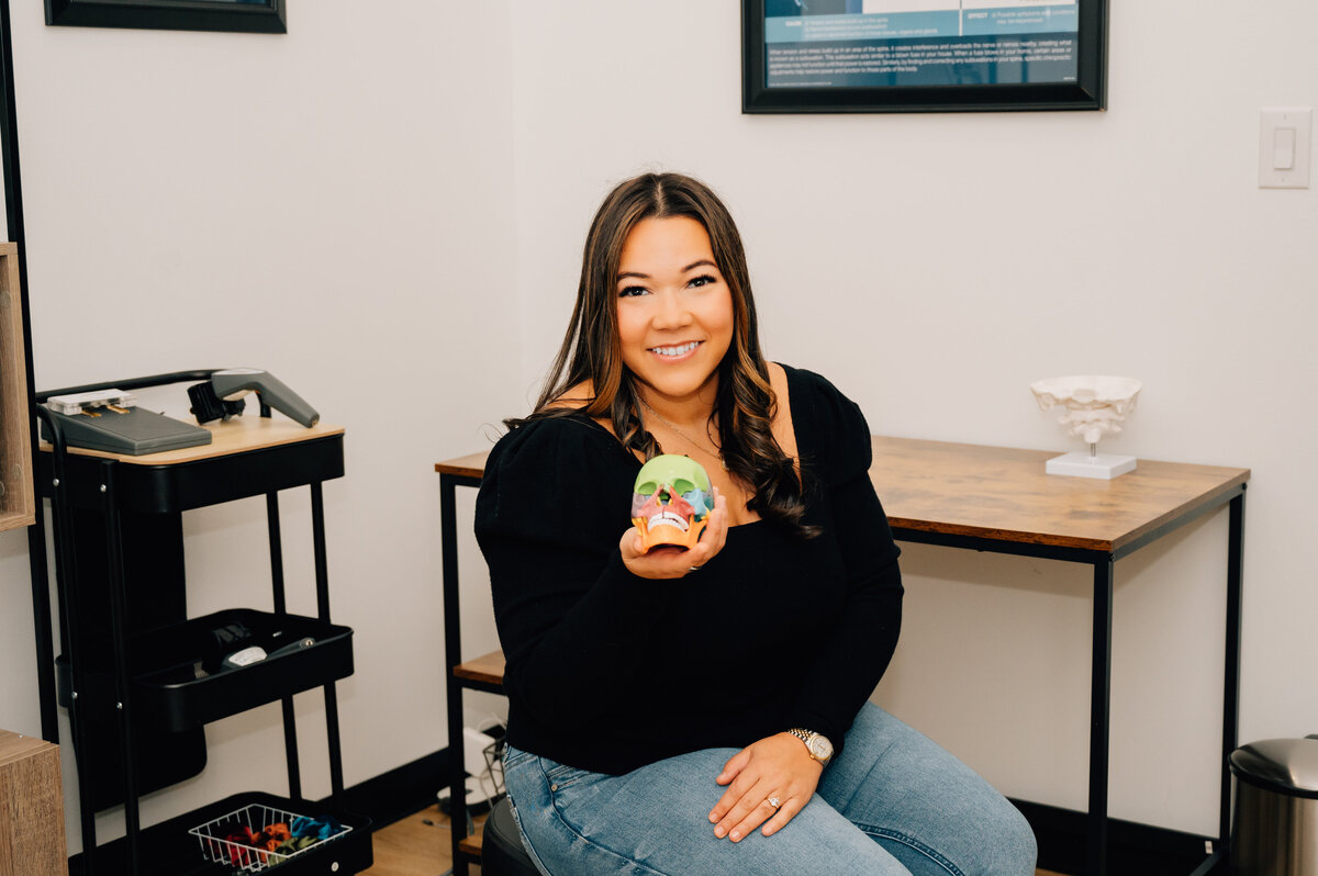 Clinic workspace with skull model by Houston medical photographer Lissette G