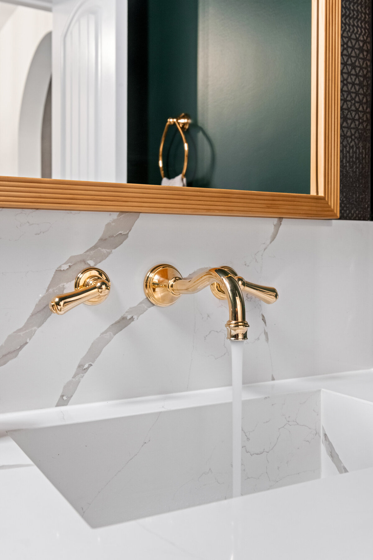 Final image of our moody luxe powder room interior design project.