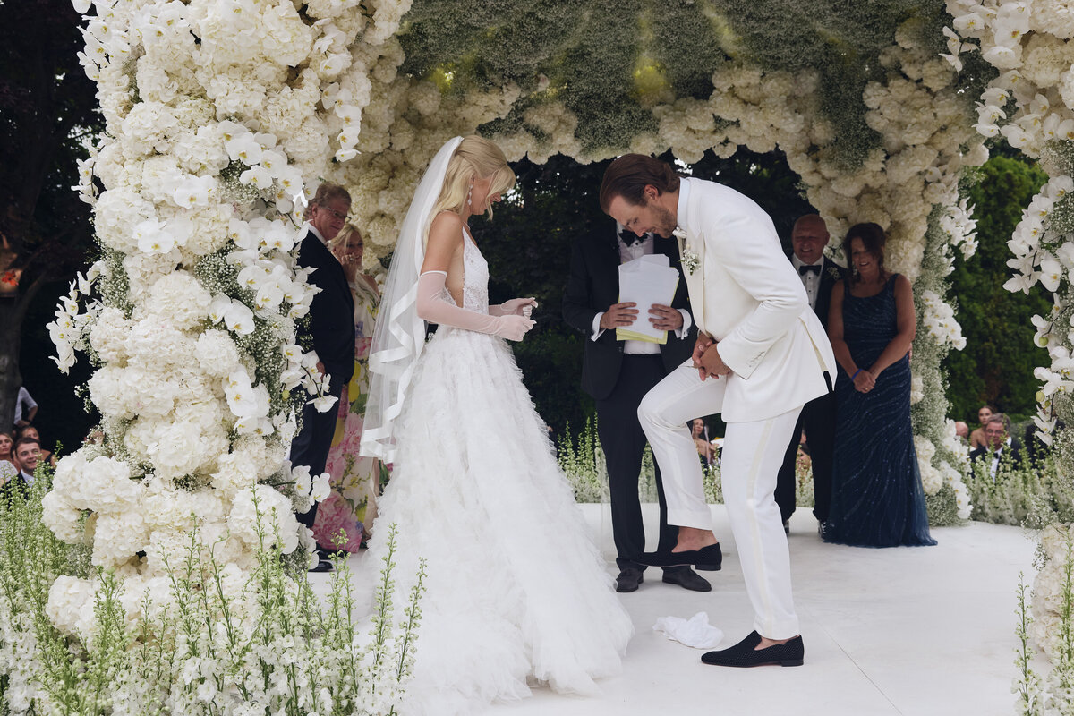 Ryan Pulock breaking the glass under the chuppah at his wedding
