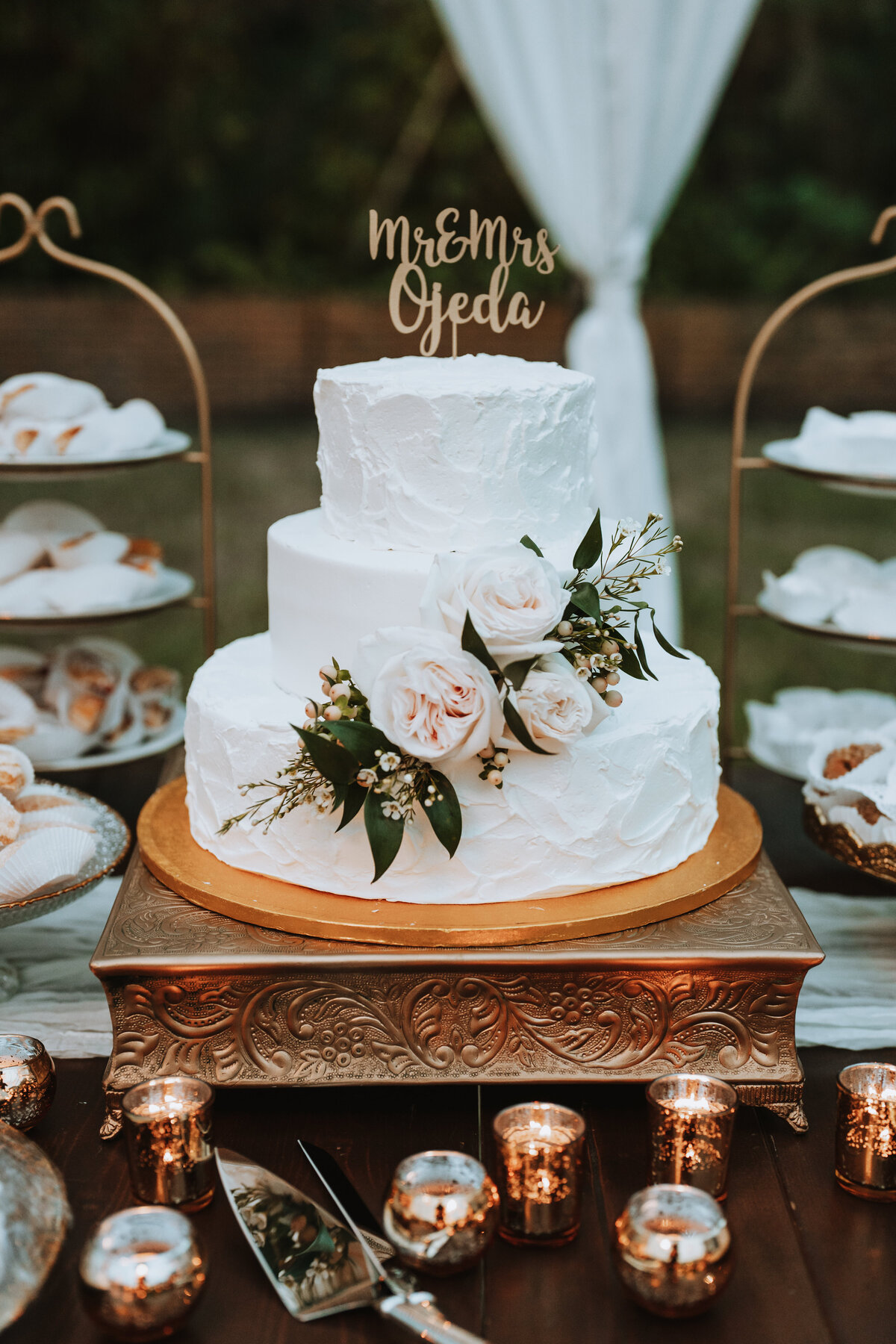 custom wedding cake on table at private residence