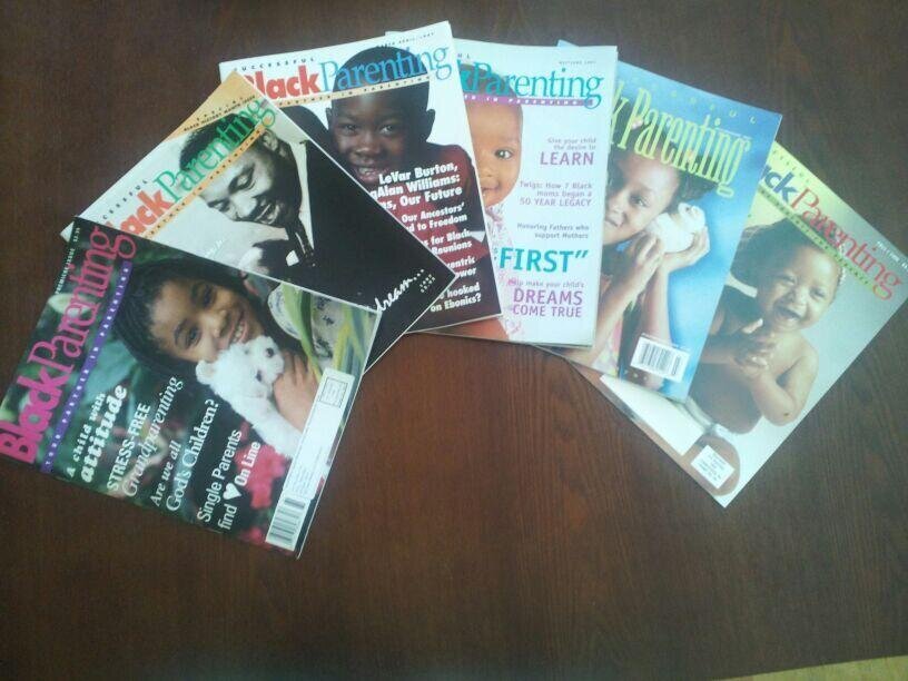 Array of Successful Black Parenting Magazine print edition covers spread out on a table, highlighting diverse themes and stories that resonate with Black families. This image showcases the magazine's rich history and commitment to celebrating Black parenting and culture.