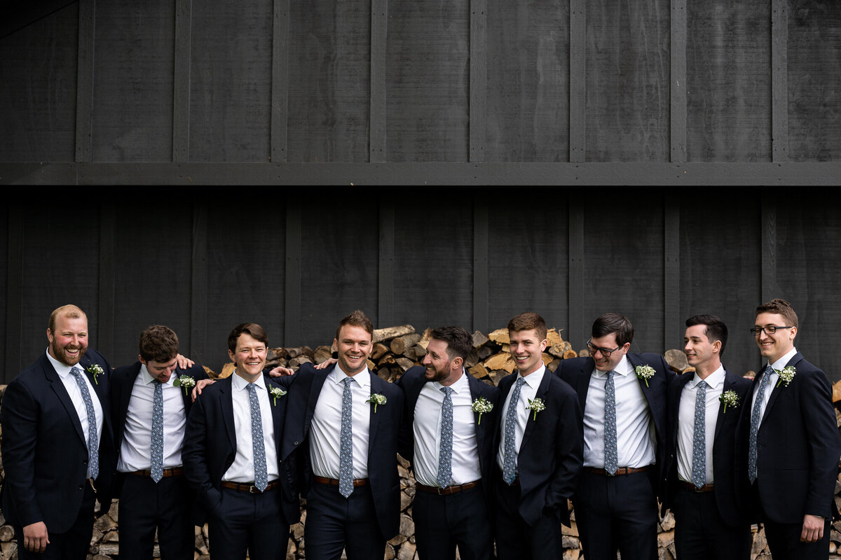 Groom and friends take group photo at Jorgensen Farms Oak Grove