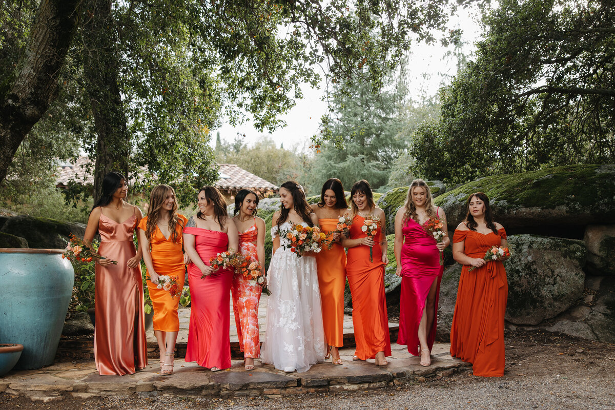 milagro wedding, bride and bridesmaids walking