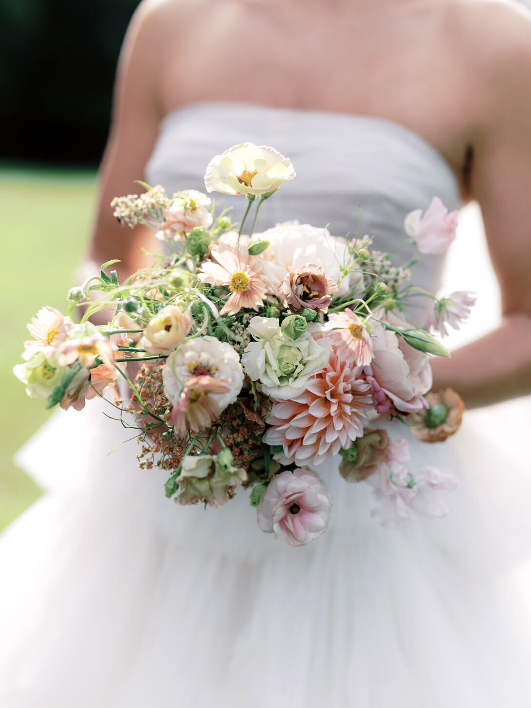 adirondack-mountain-wedding-17-oscar-de-la-renta-bridal-bouquet-close-up-with-soft-colors-by-hudson-botanica-at-adirondack-mountain-wedding-jenny-fu-studio