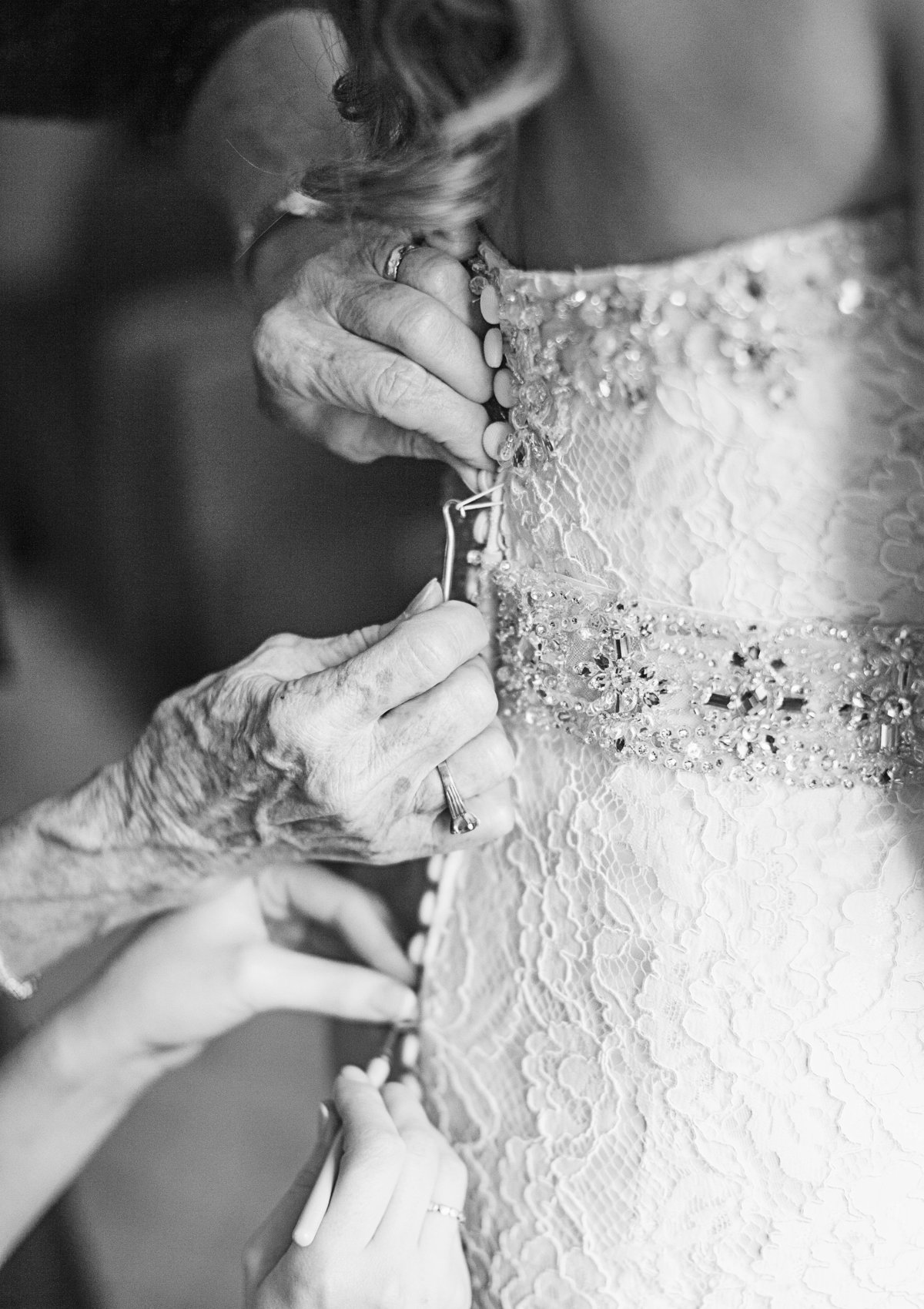 grandma helping bride get ready