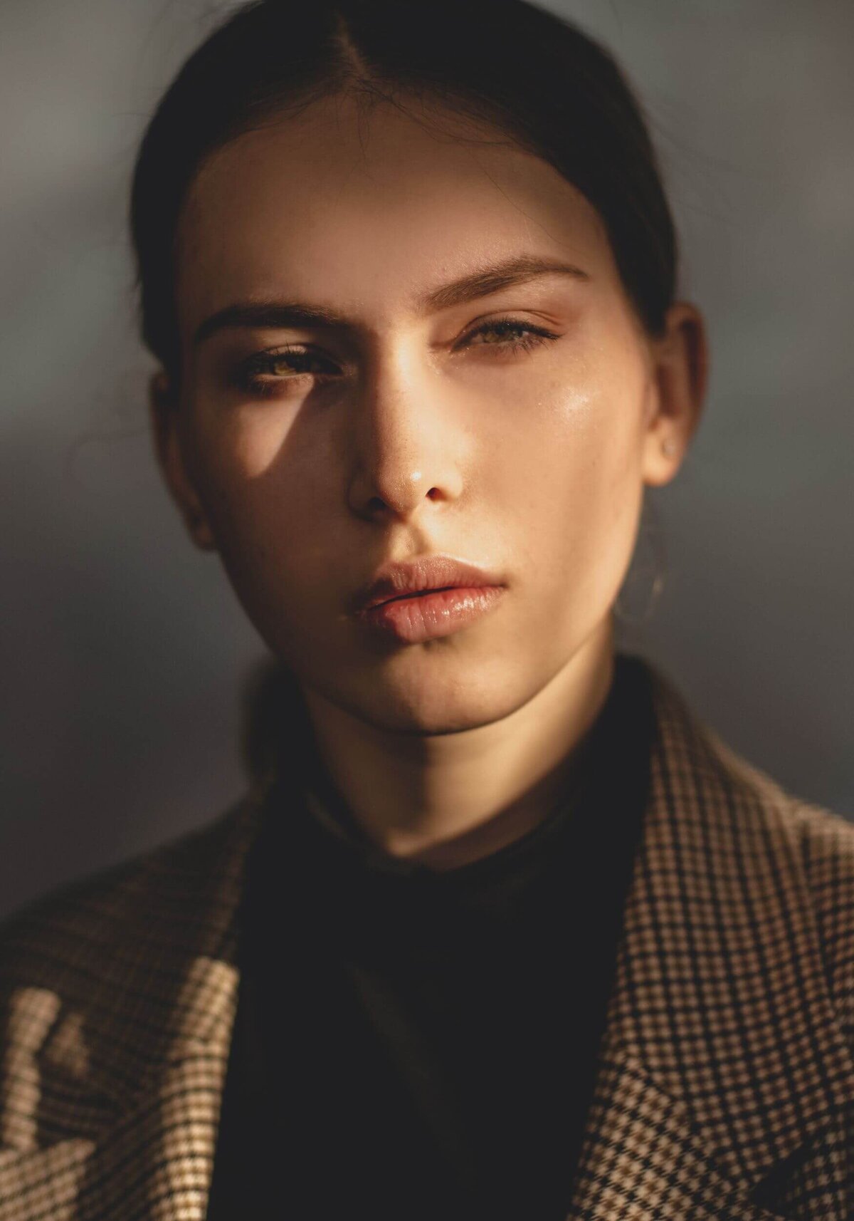 Woman in Brown Checkered Button Up Shirt