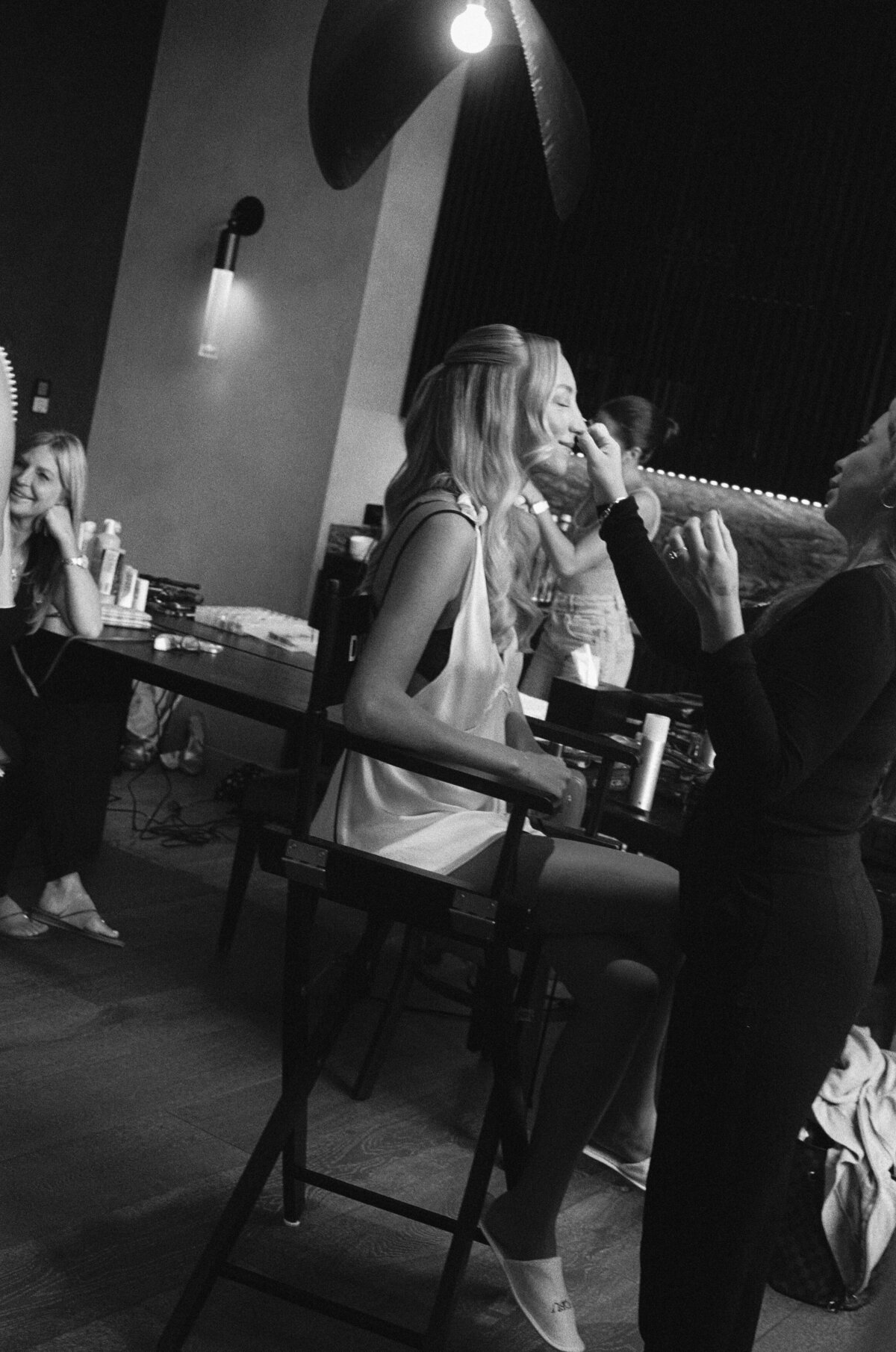 Fashion forward bridal preparation captured in editorial wedding photography style at NOBU Hotel Chicago, showcasing Lauren Alatriste's ability to create magazine-worthy imagery combining luxury aesthetics with authentic wedding emotion.