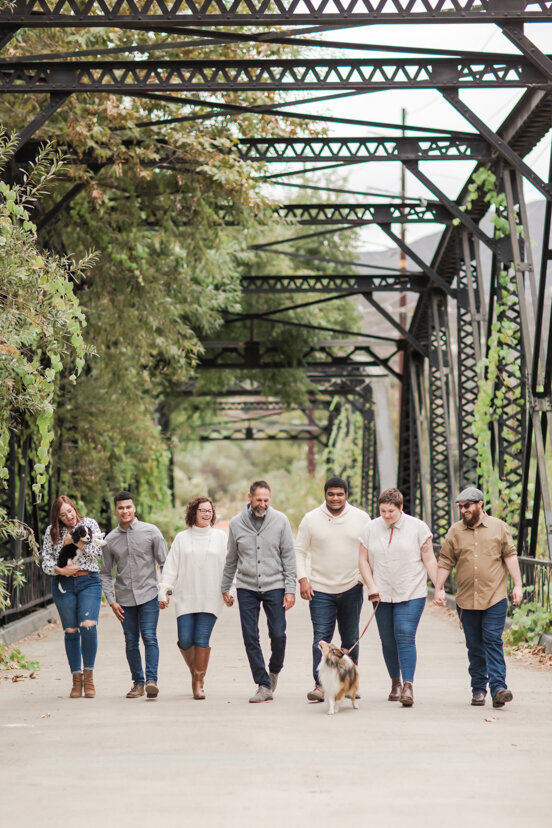 large-family-walking-on-sweetwater-river-bridge-san-diego
