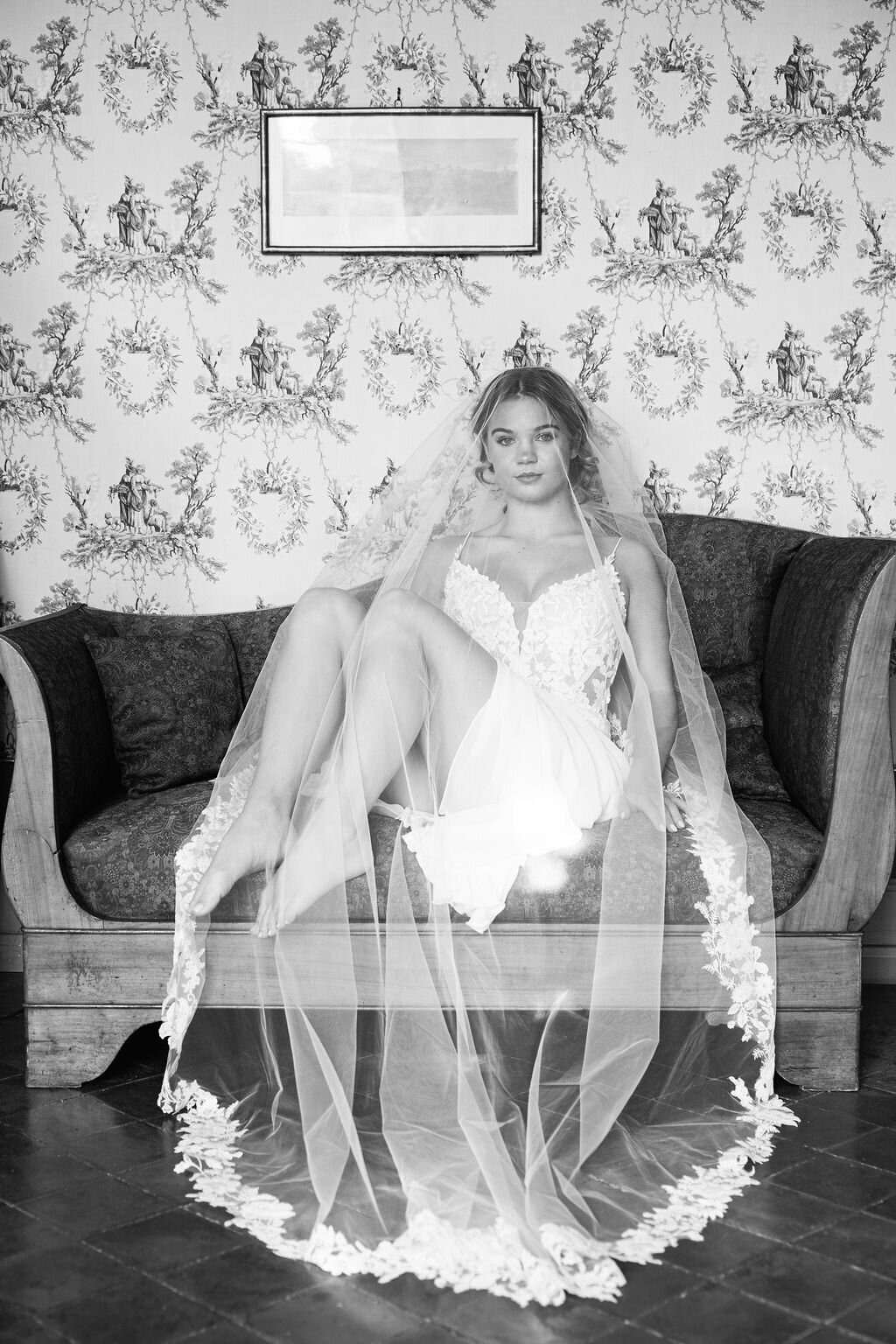 french-chateau-bride-with-veil-on-sofa