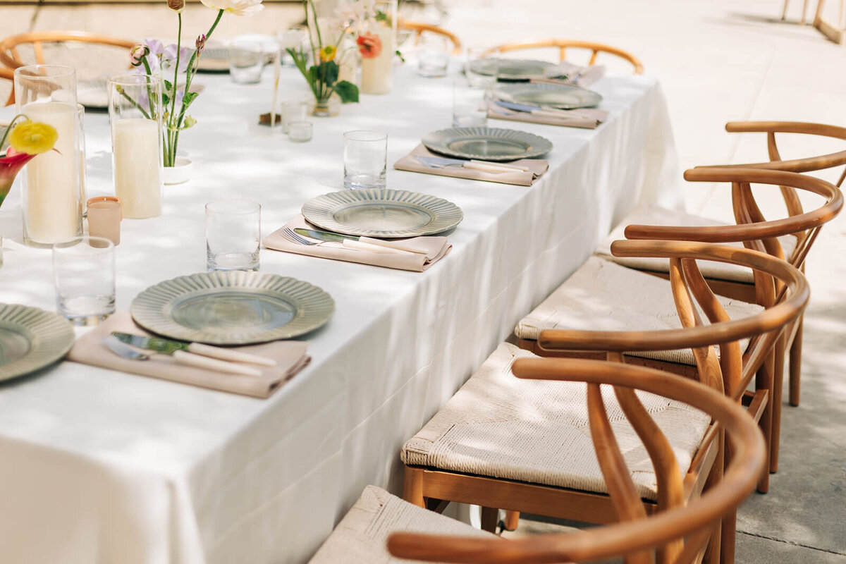 A close up of a set table at a backyard wedding reception in Boise, Idaho.