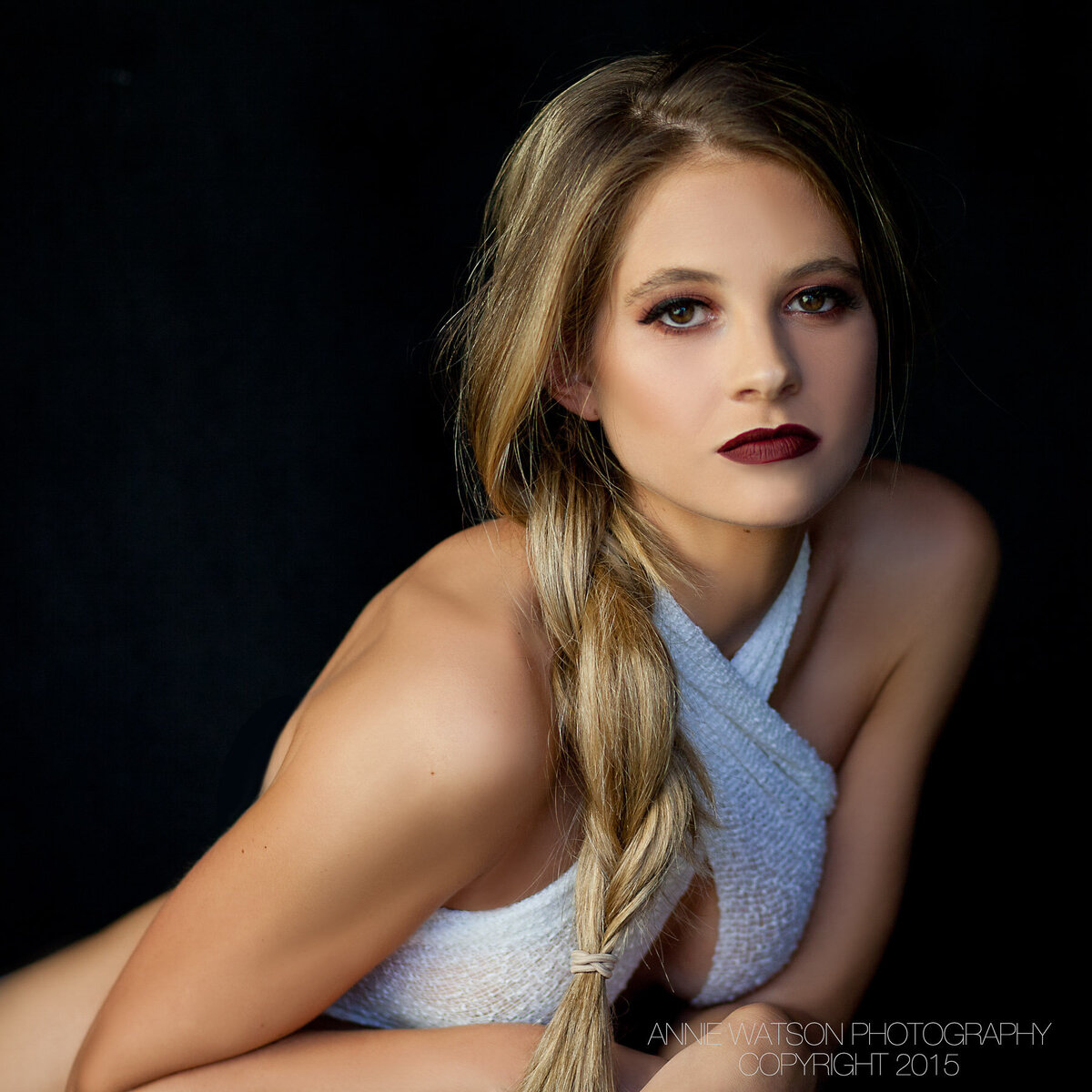 Soft glam meets edge: radiant skin and deep berry lips styled by Lydia Arroyo.