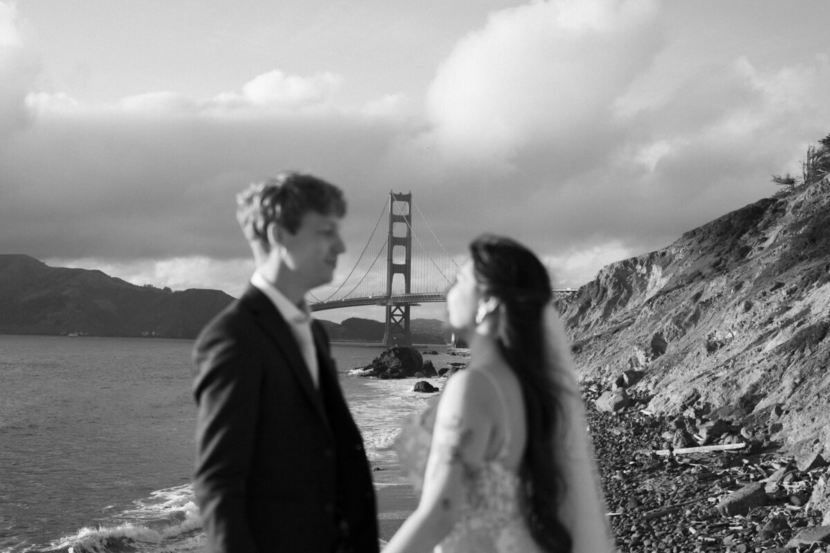 Bride and Groom at Marshall's Beach in San Francisco, California at sunset
