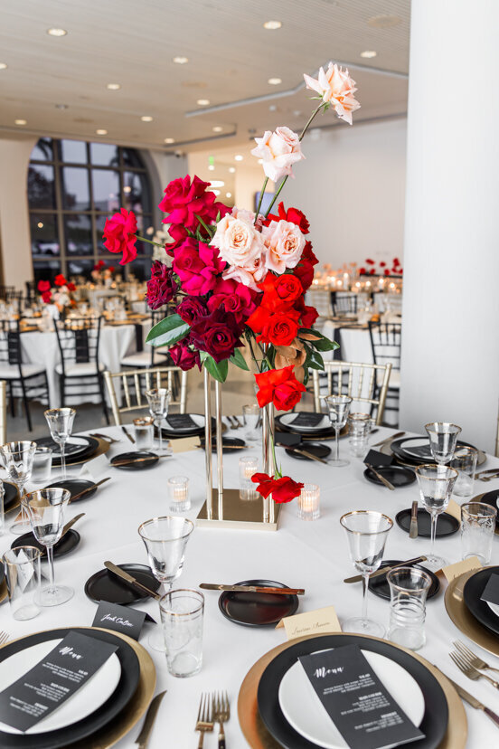 table-settings-with-red-flowers-at-museum-of-contemporary-arts-san-diego-wedding