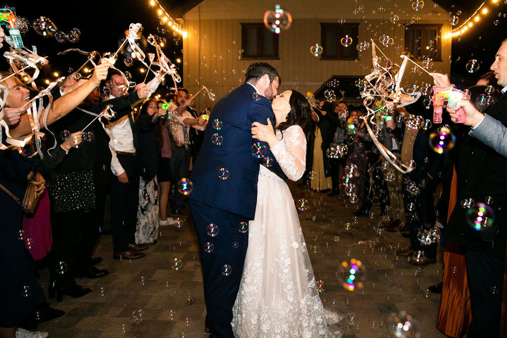 Grand exit with bubbles and ribbon wands