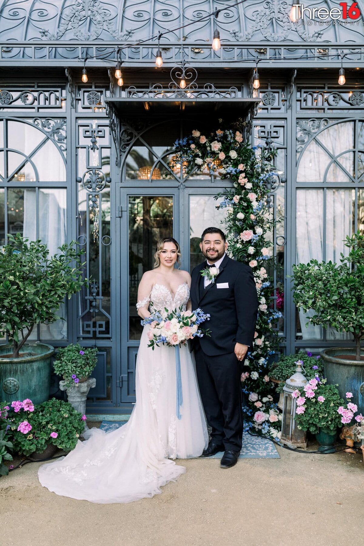Bride and Groom pose for photos at the beautiful Lavender Marketplace & Workshops