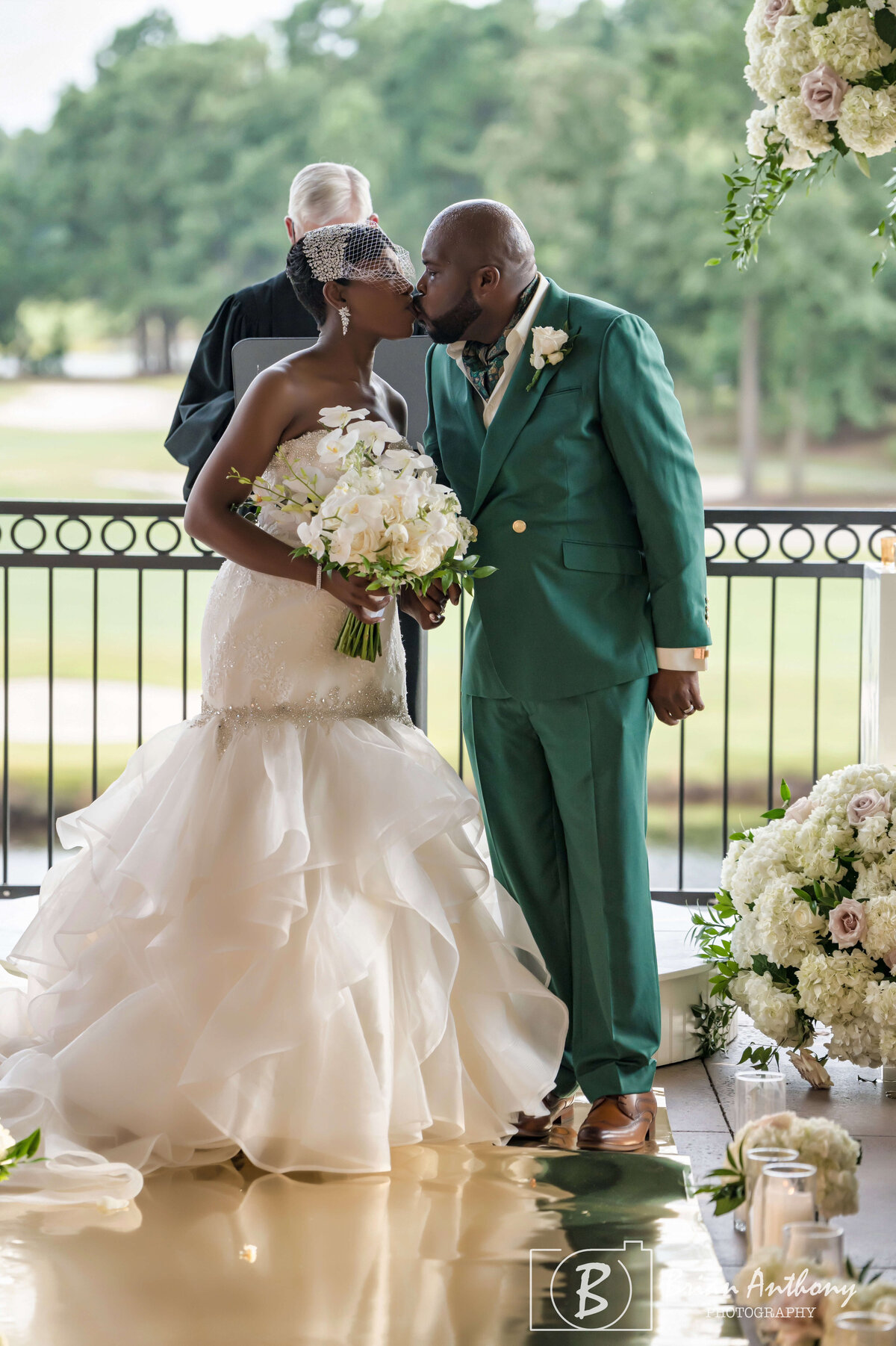Bride and groom sharing an intimate first dance at their wedding reception.