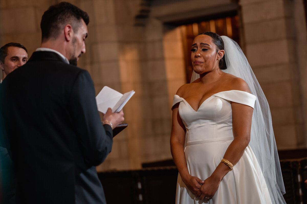 A bride cries during her church wedding ceremony