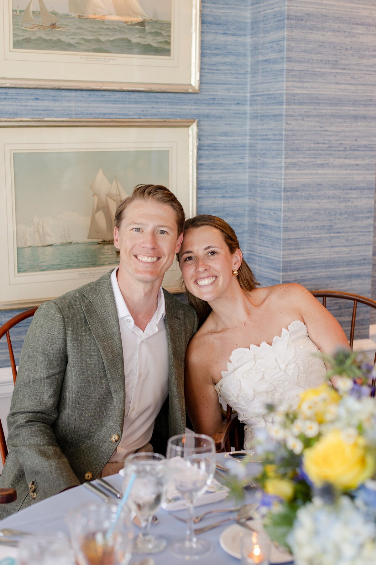 Bride and groom smiling during the rehearsal dinner at American Yacht Club in Rye, NY