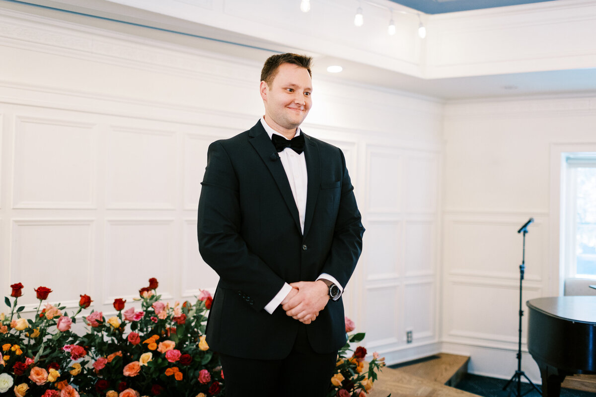Grooms reaction watching his Bride walking down the aisle at St. Paul College Club.