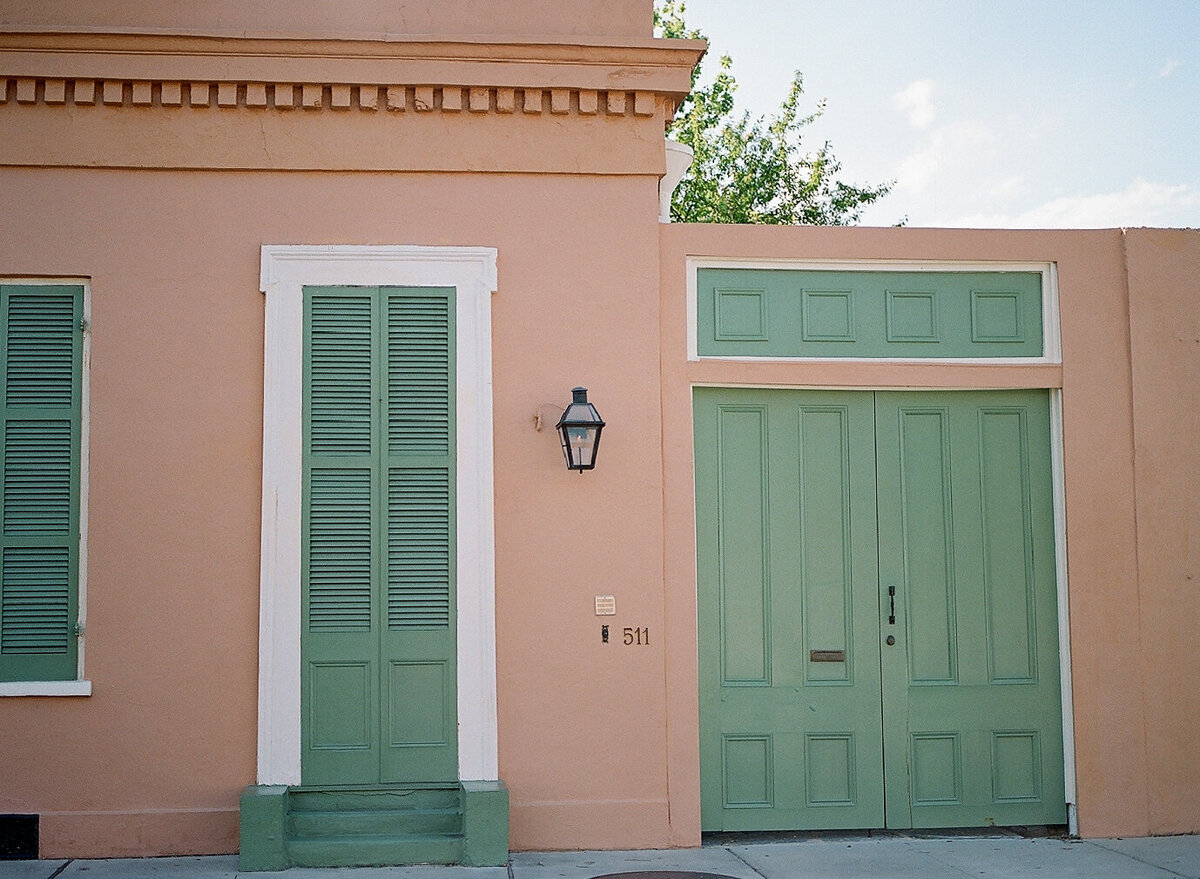 Home in New olreans with shutters and bright doors of the French quarter