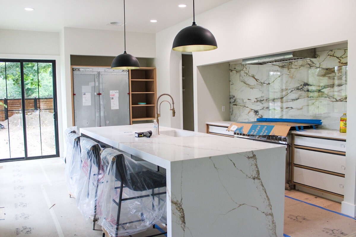 kitchen with marble bar in process of being built
