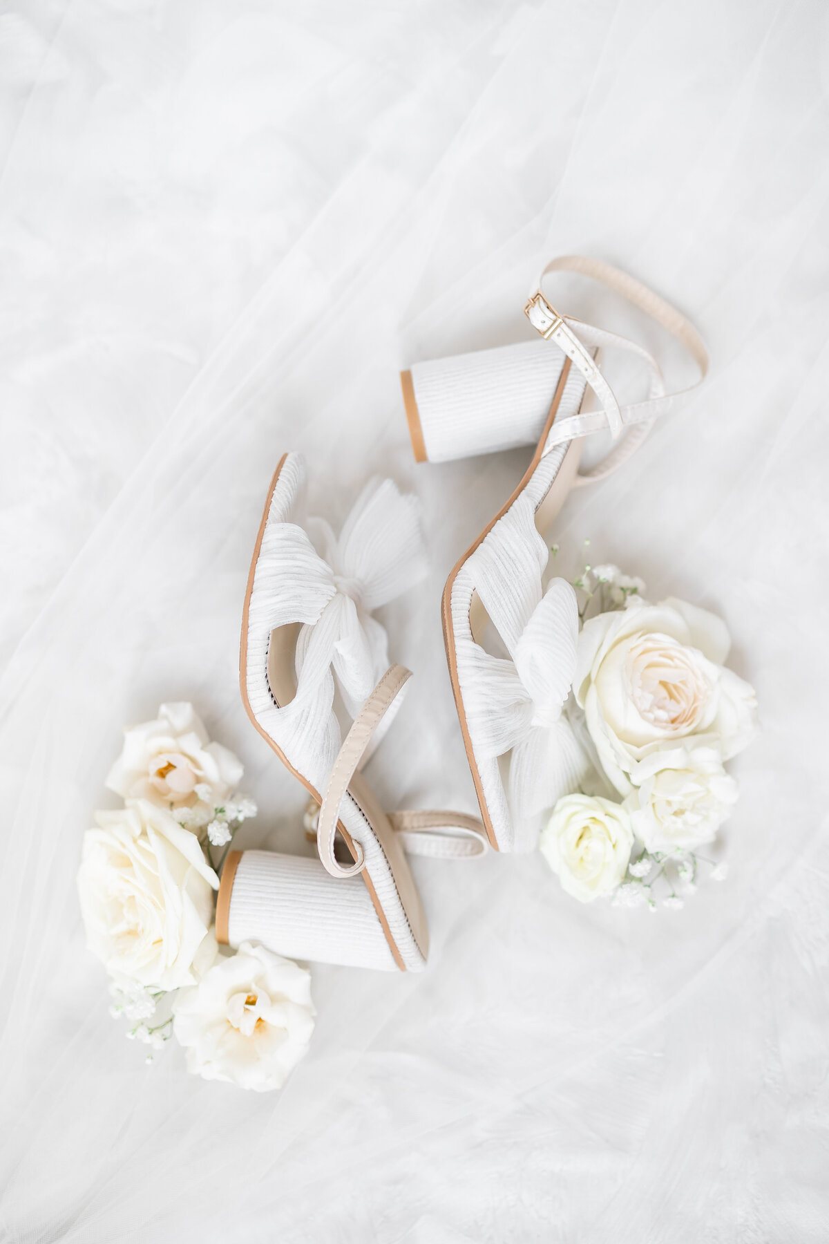 bridal shoes and flowers by wedding photographers in miami fl