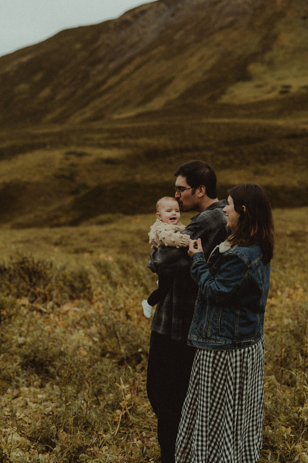 photos of family during family session in alaska