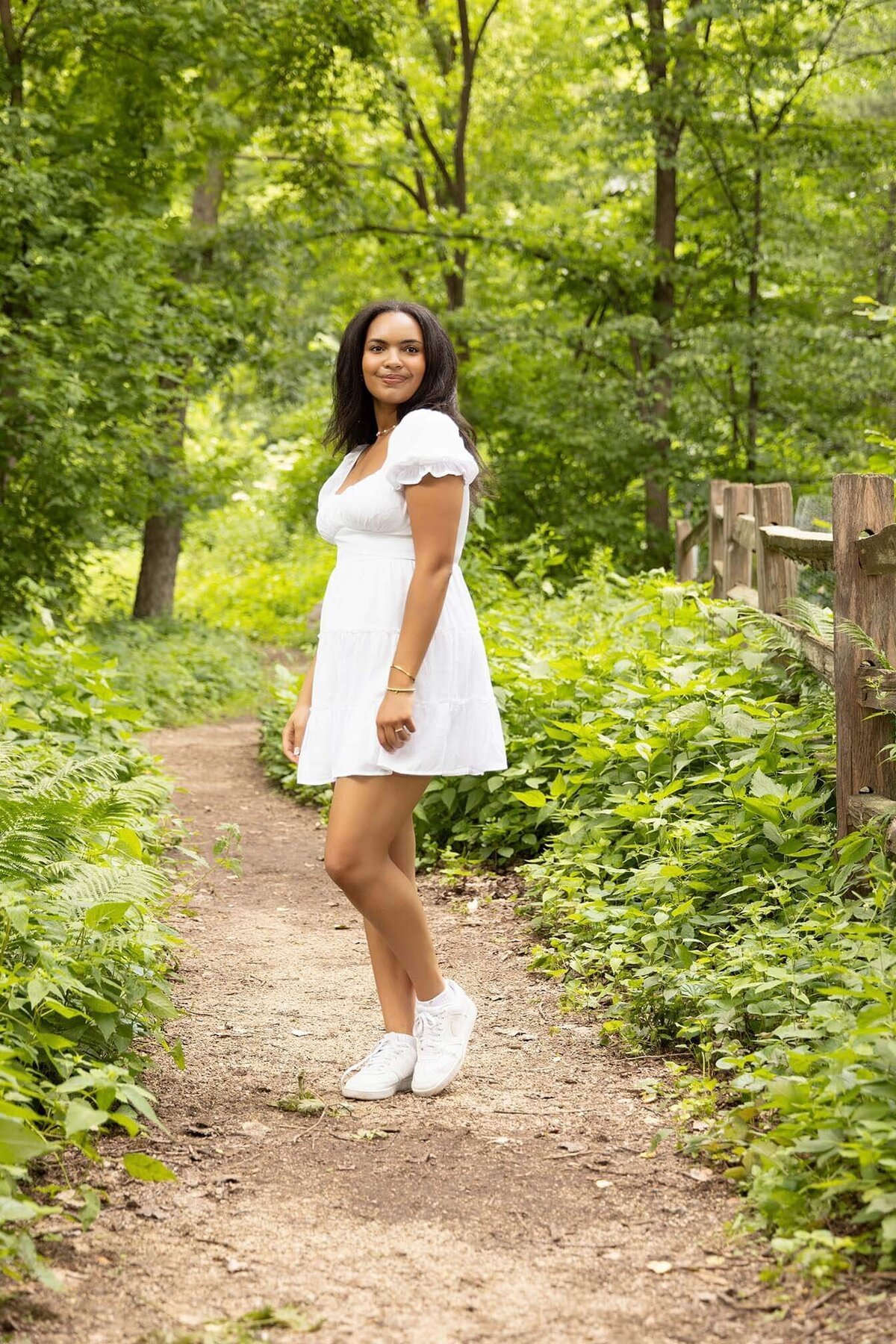 senior-girl-walking-on-nature-trail