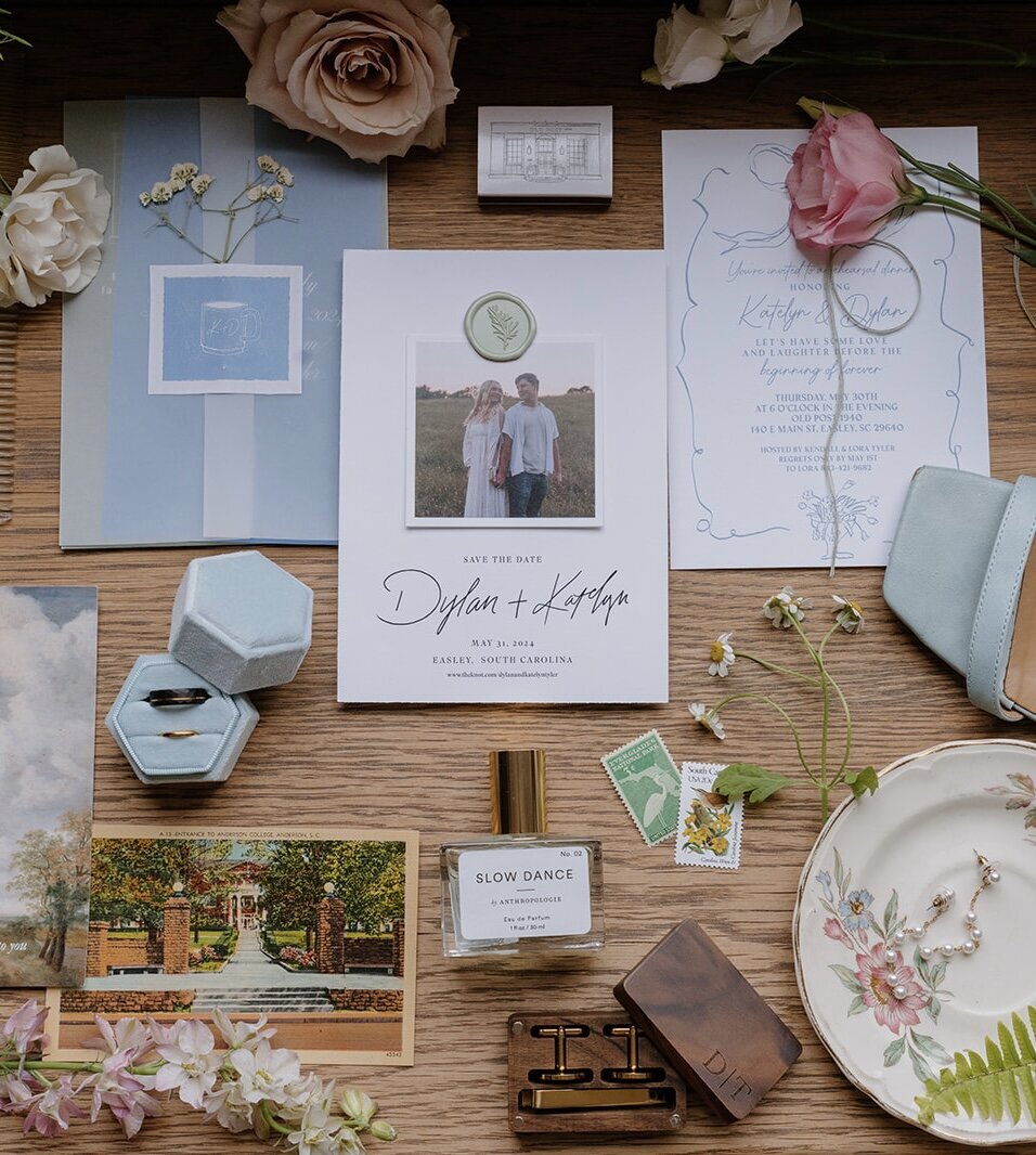 Wedding invitation flatlay with florals designed by Abby Grace Florals at Easley SC wedding
