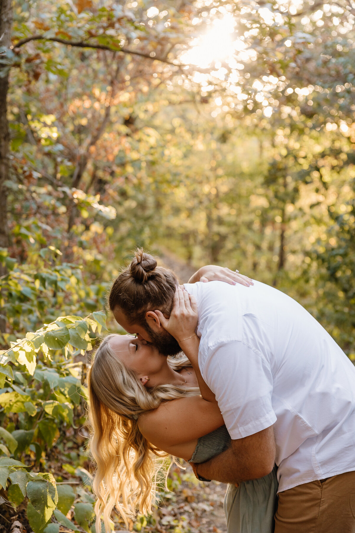 A person dipping their partner and kissing them