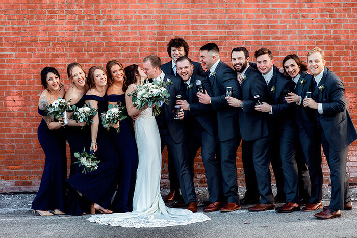 bride-groom-kiss-bridal-party-shouts