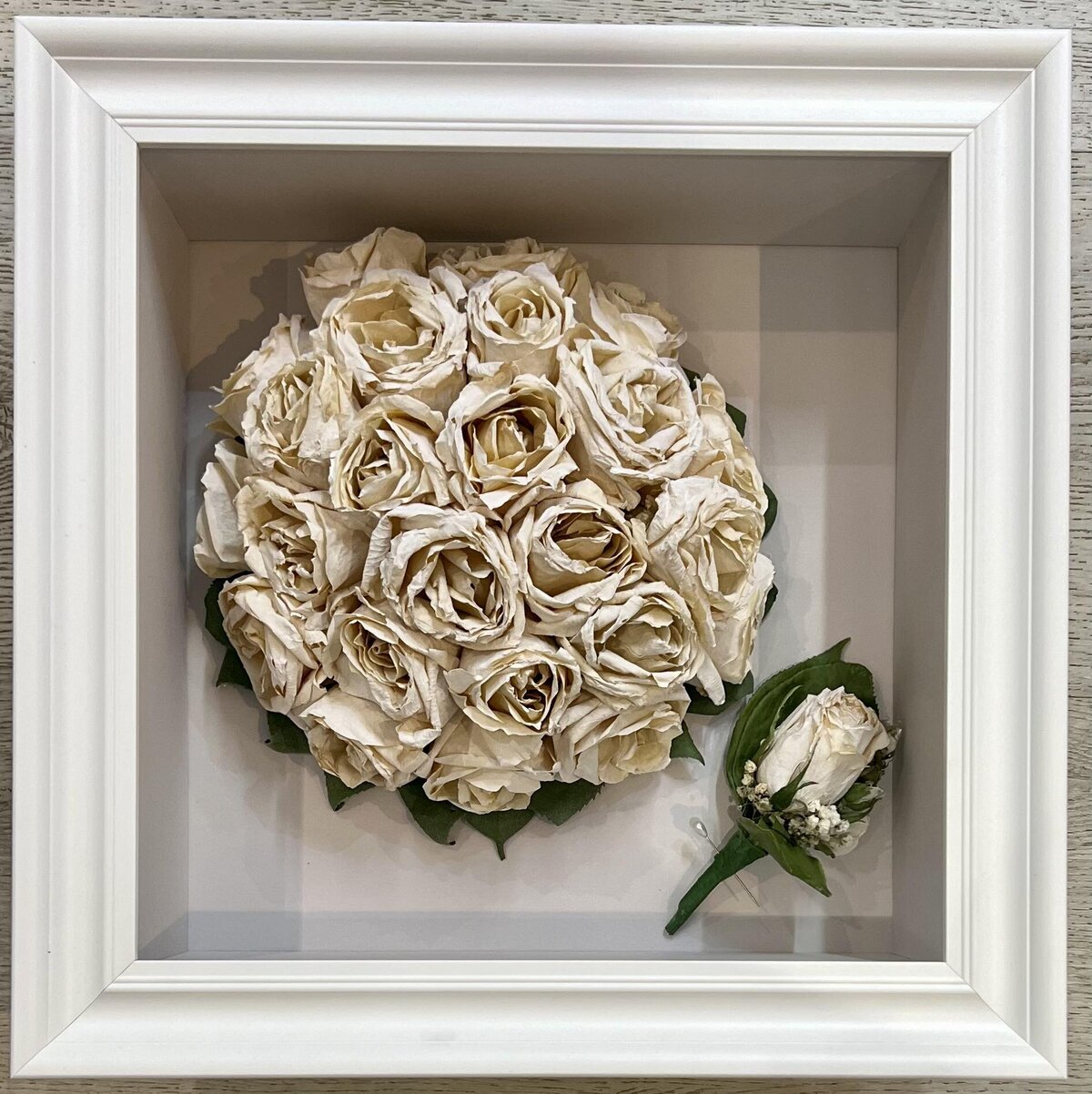 Wedding bouquet preserved in 3D frame.