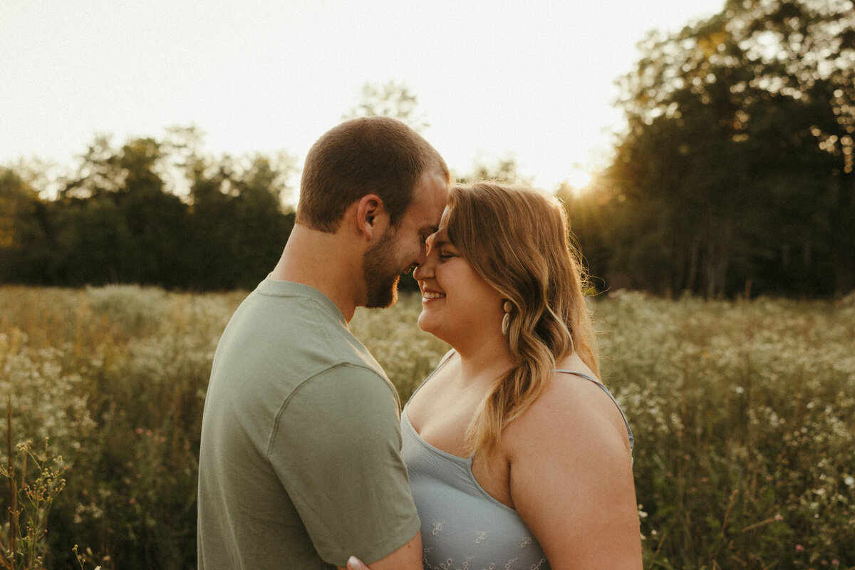 Julia-adam-engagement-salisbury-nh-wildflower-field-summer-51