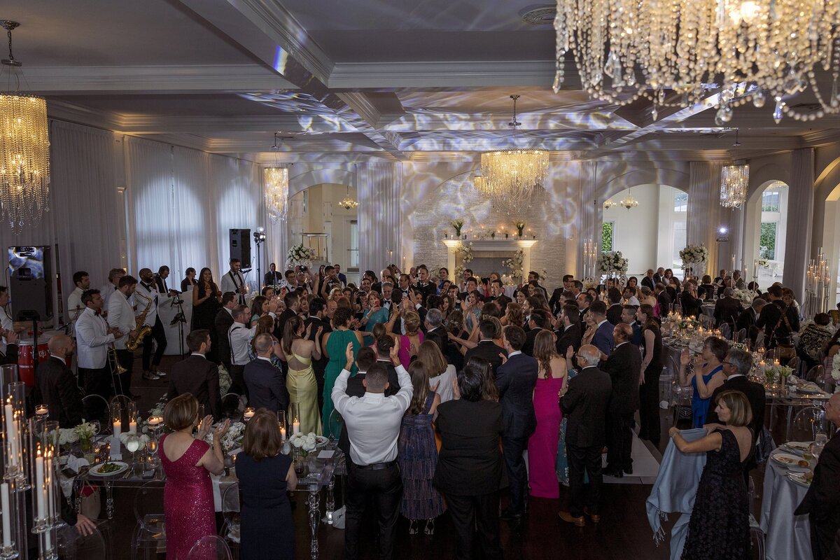 Guests enjoy the dance floor during wedding at Belle Mer Newport.
