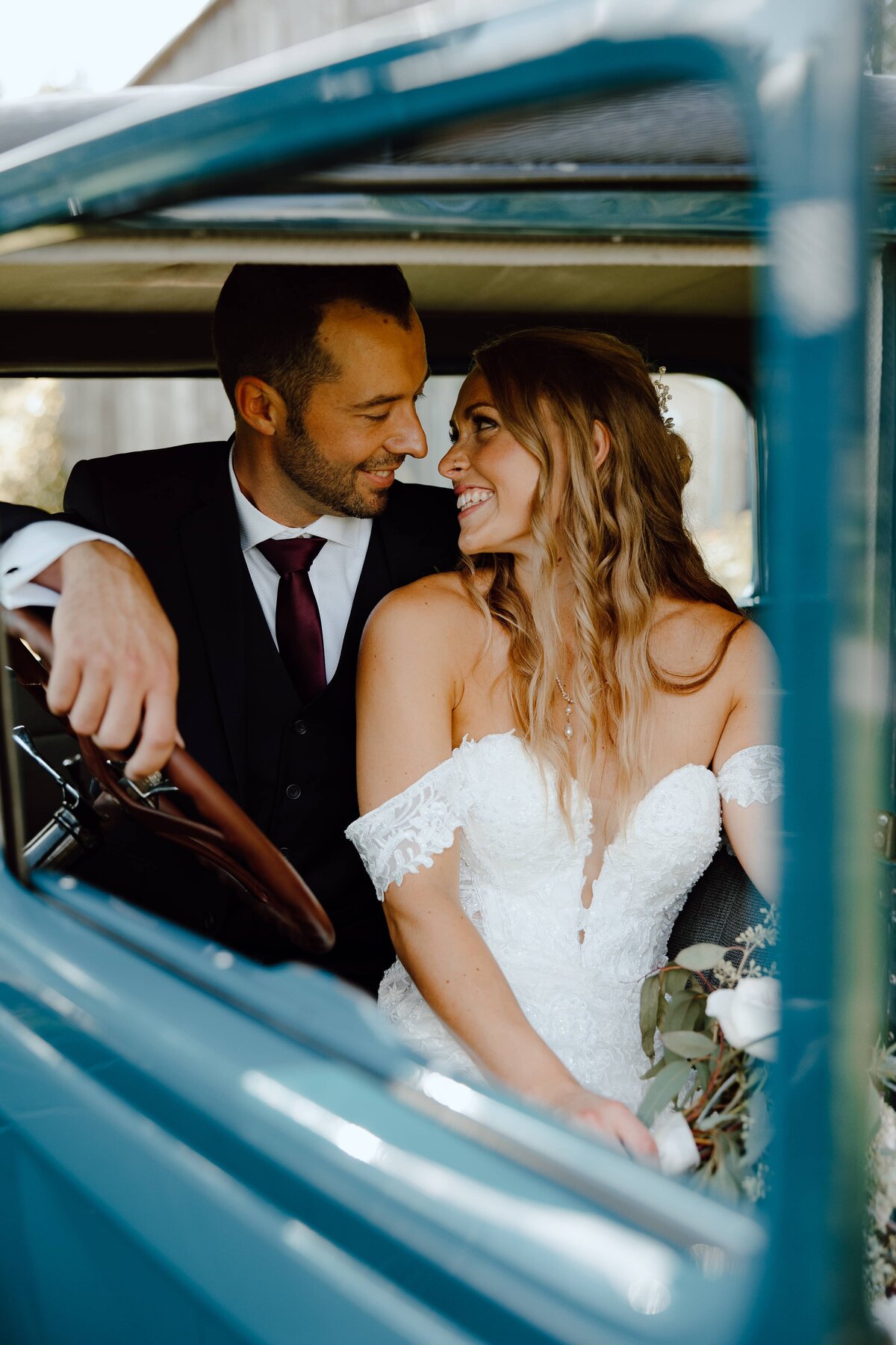 bride-and-groom-in-blue-pickup