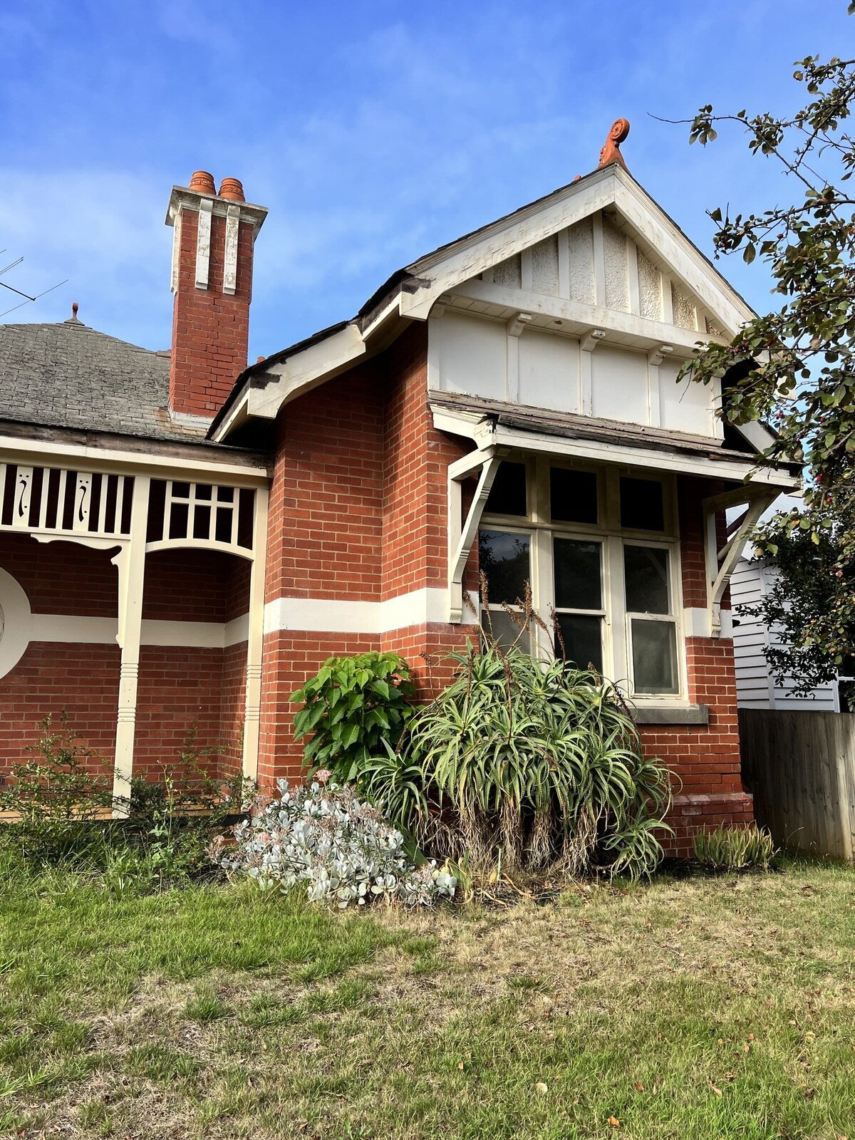 Exterior of a Federation Home Renvation - red brick wall and timber features