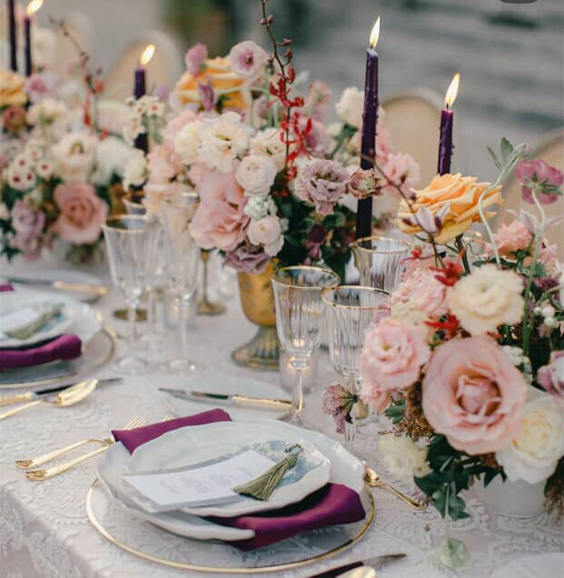 an elegant table setting for a Catholic wedding reception