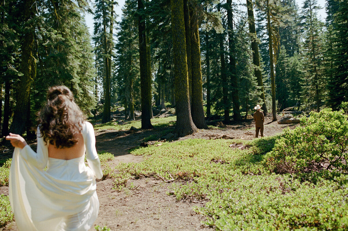 Bride walking to the first look at Mt. Shasta trailhead.