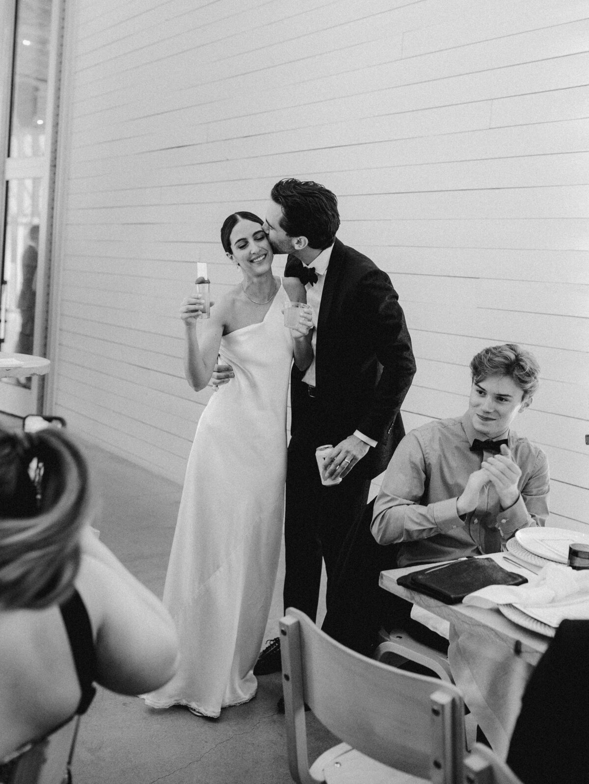 Groom kissing bride at Prospect House Wedding Austin