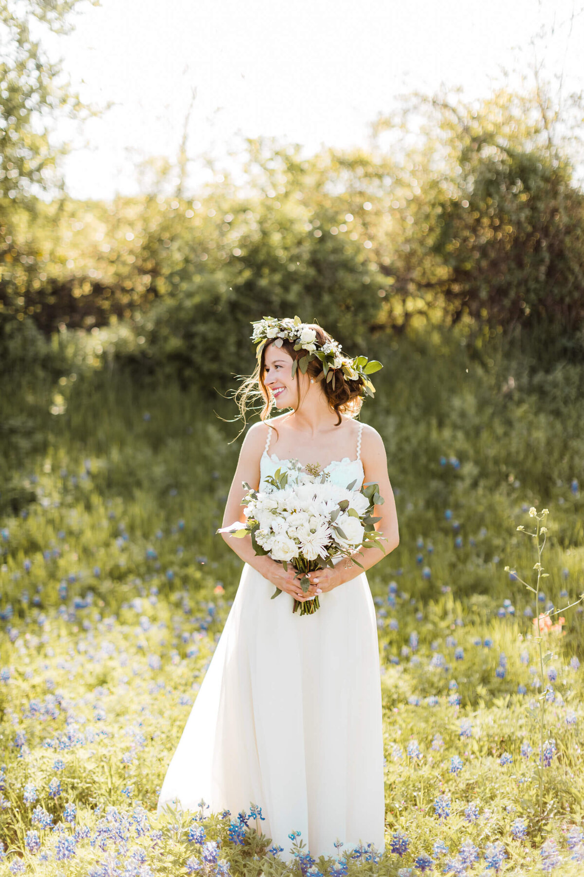 Photos of the bride with bluebonnets in Dallas, TX