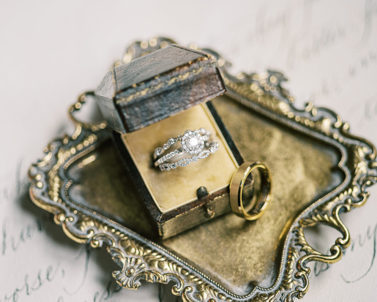 A classic ring shot on a gold tray .