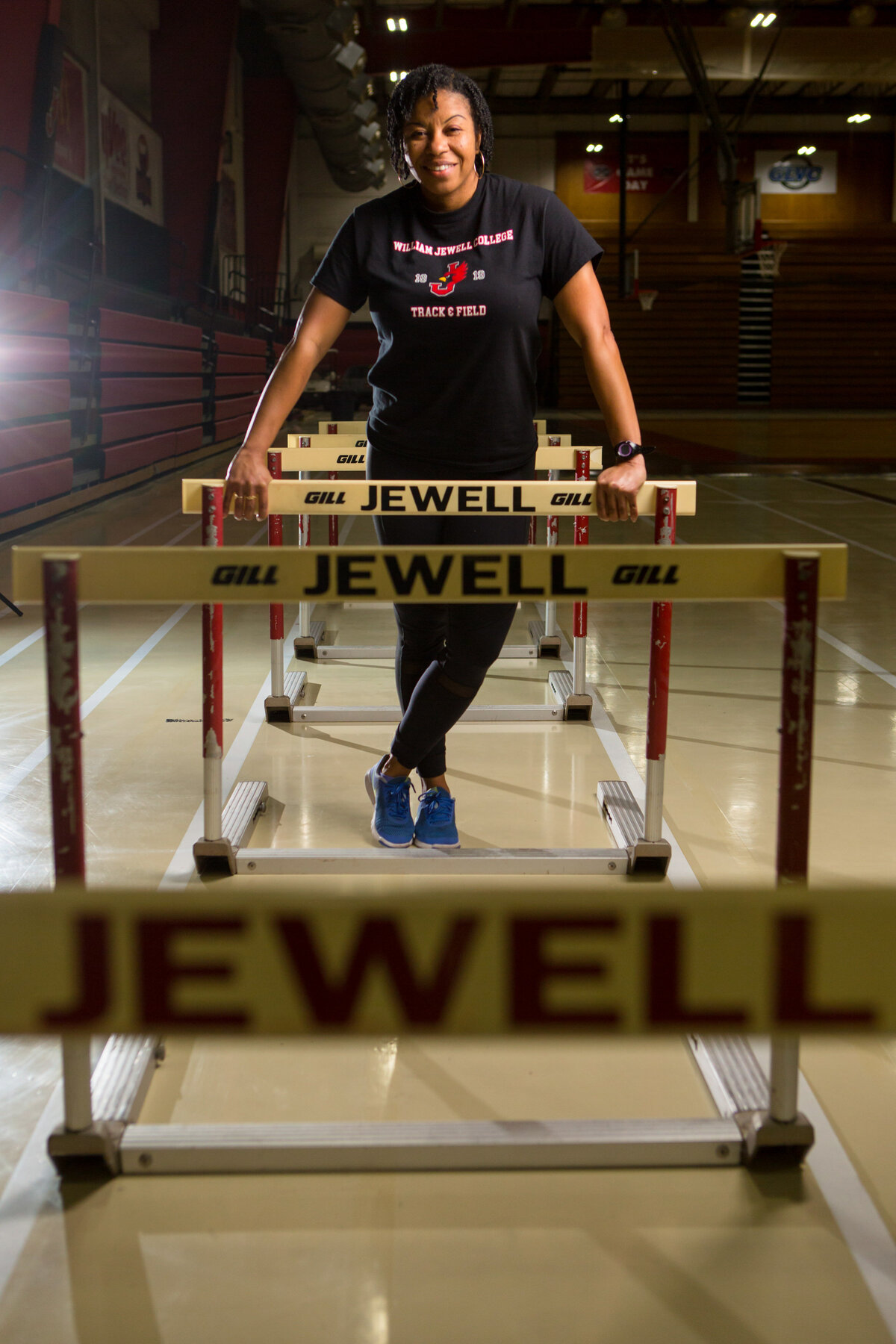 kansas-city-sports-photography-0307-athlete-standing-behind-hurdles