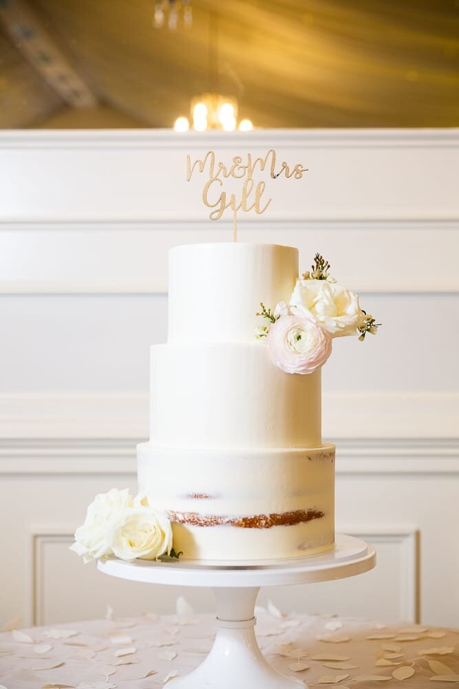 simple-white-wedding-cake-gold-calligraphy-topper