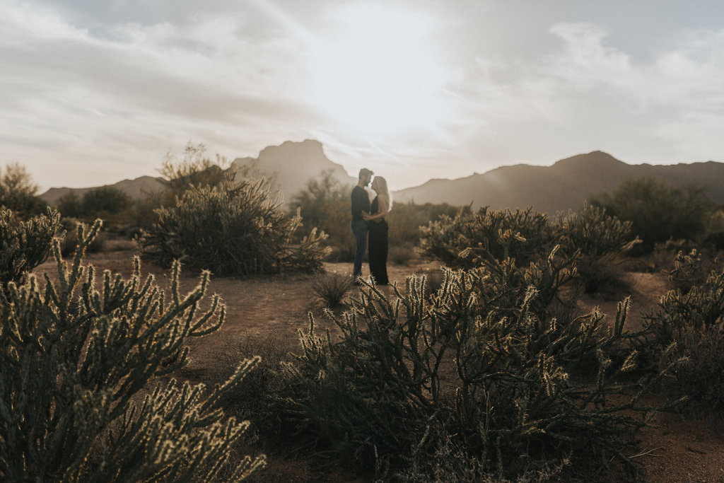 An in love couple during their adventure engagement session in Page Arizona