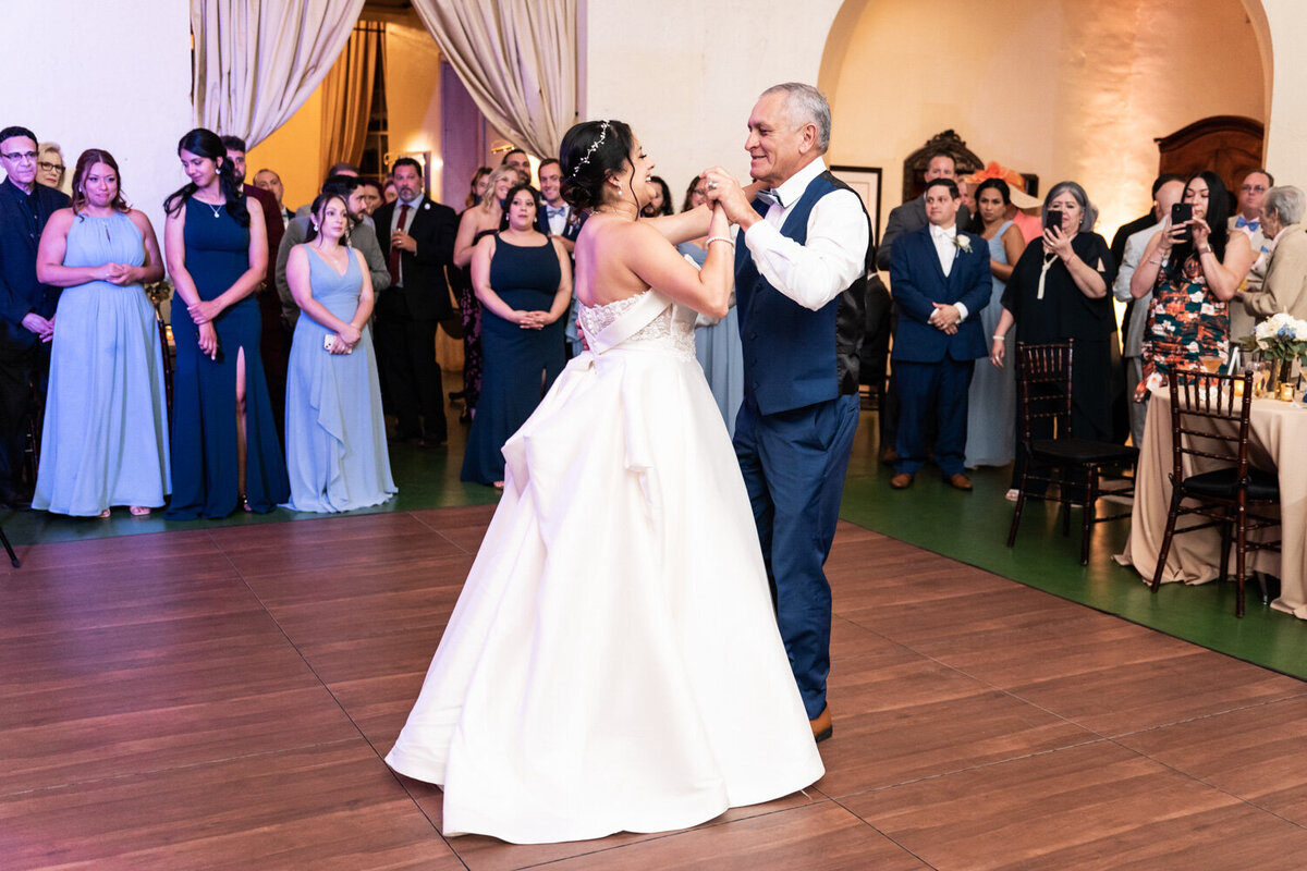 Bride and father dancing