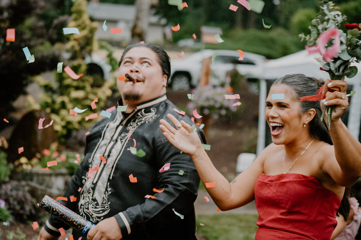 Family celebrating the bride and groom after they were married. 