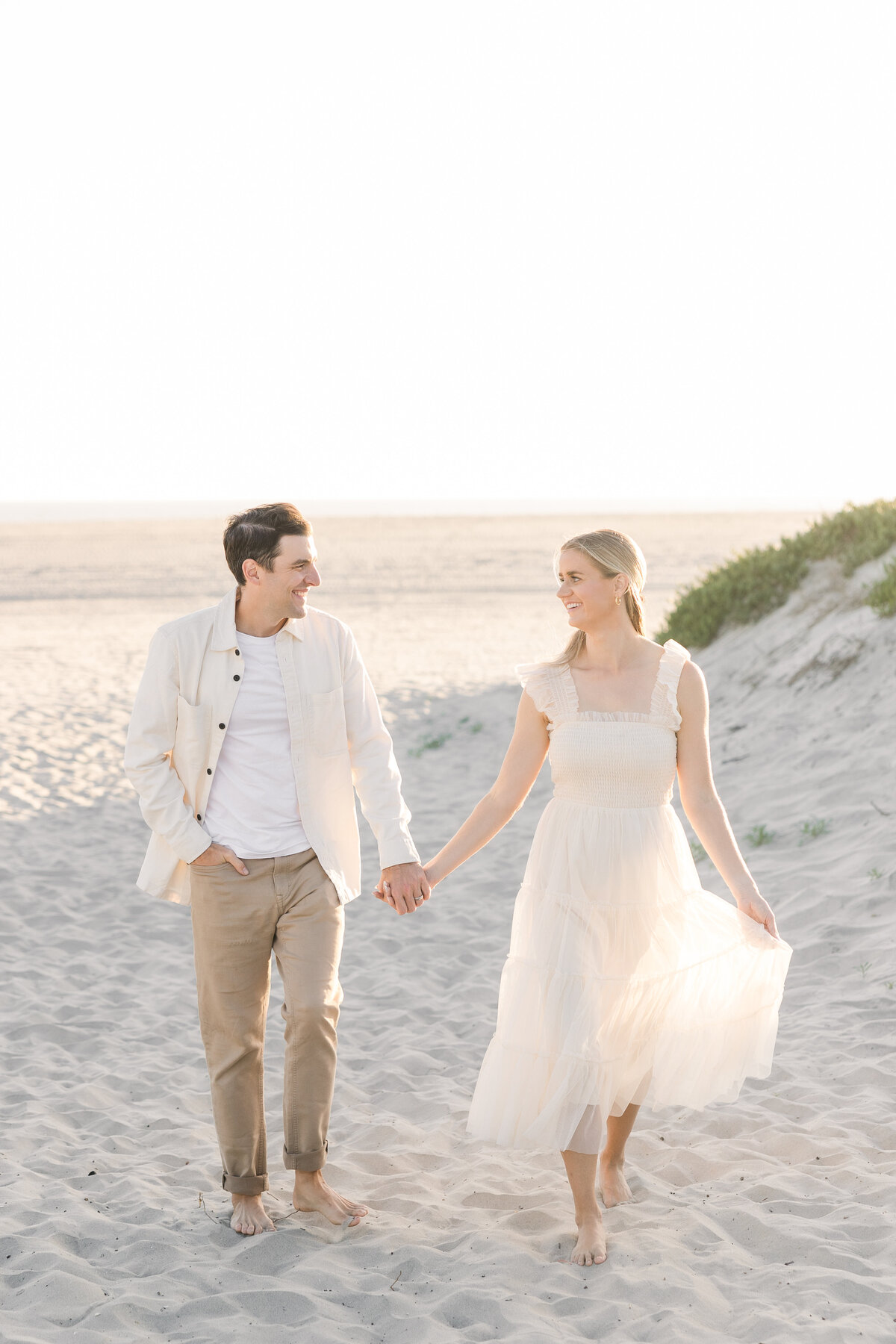 san-diego-family-photo-session-coronado-beach-parents-walking-on-beach