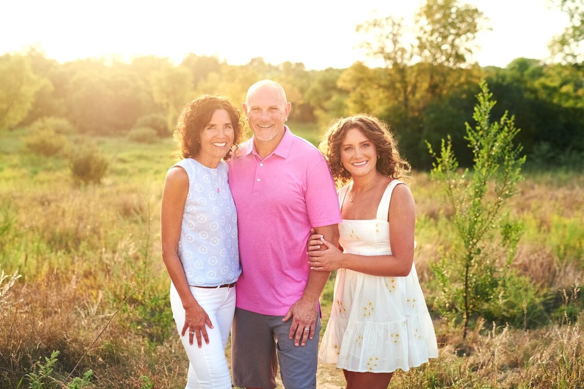 Family Portrait by Senior Picture Photographer in Sunlit Field-01