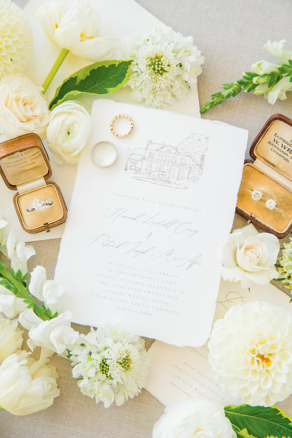 romantic invitation suite styled with rings and florals
