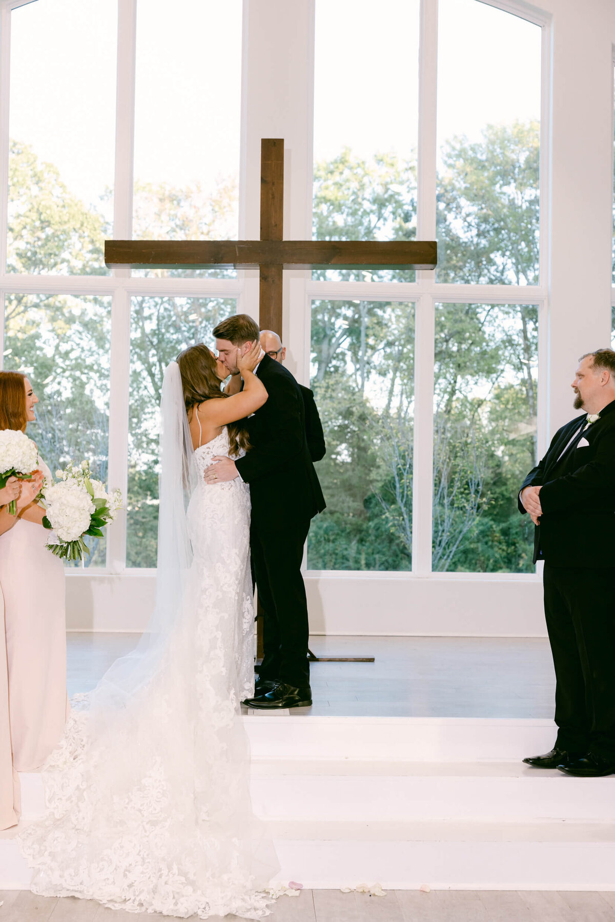 A wedding photo of the bride and groom during the ceremony